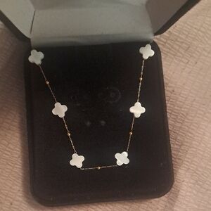 Elegant Gold and White Clover Necklace